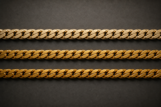 Three yellow gold Cuban link chains showing the colour difference between 10K, 14K and 18K gold