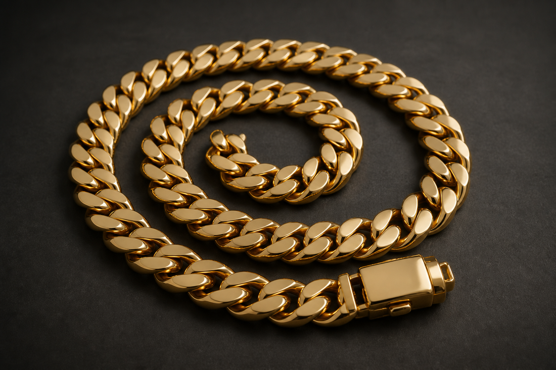 A polished Miami Cuban link gold chain coiled into a spiral with a box-lock clasp