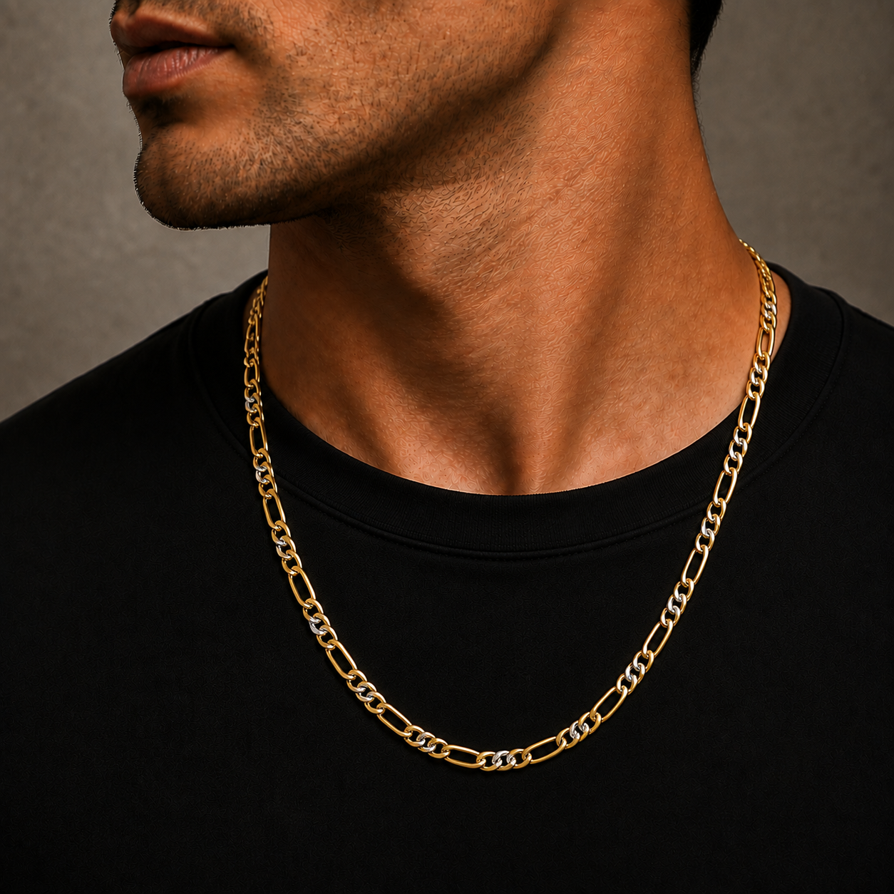 10K Yellow Gold Solid Diamond-Cut Figaro Chain, shown worn on the neck