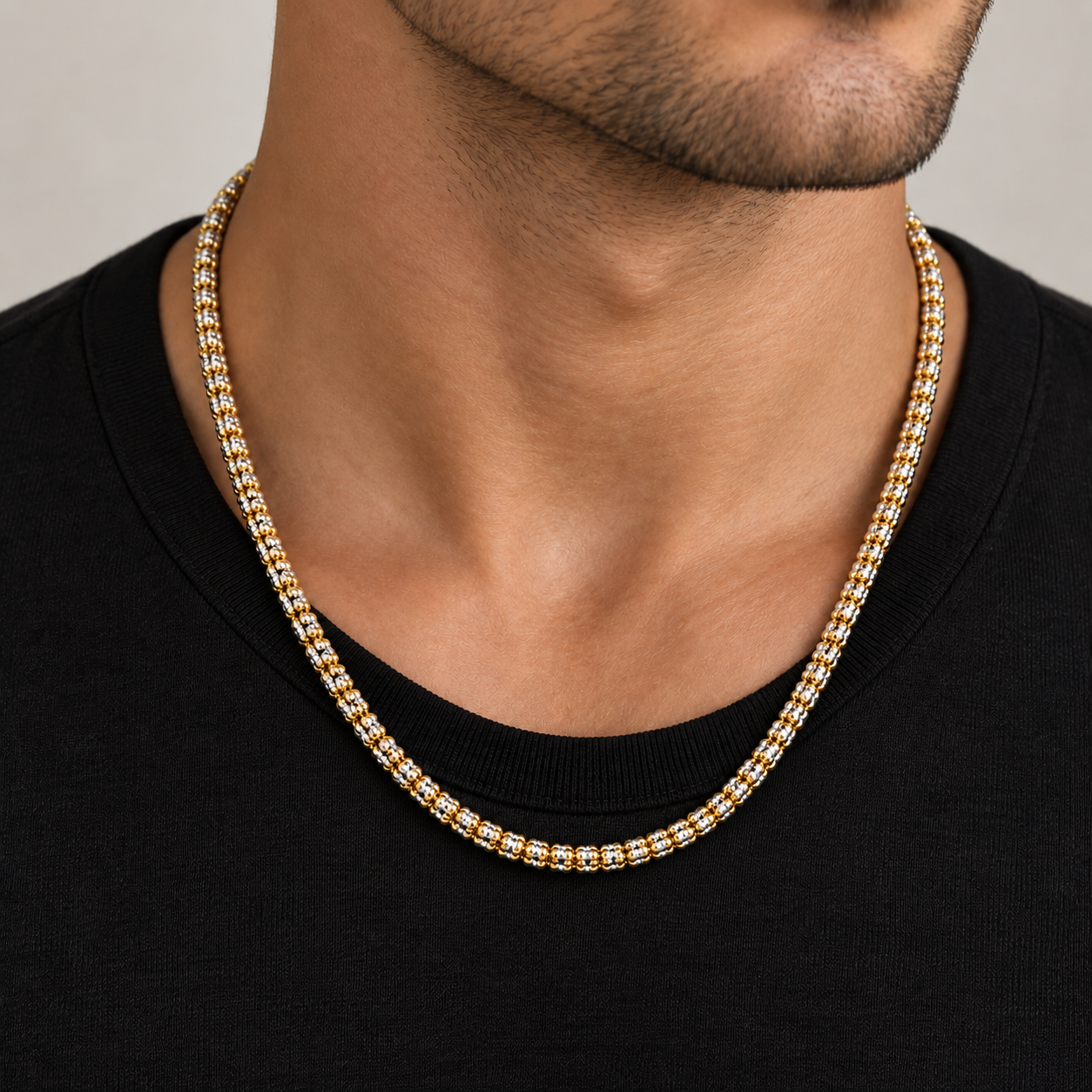 10K two-tone gold diamond-cut rolo link chain, detail view