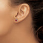 Sterling silver ladybug stud earring worn on the ear