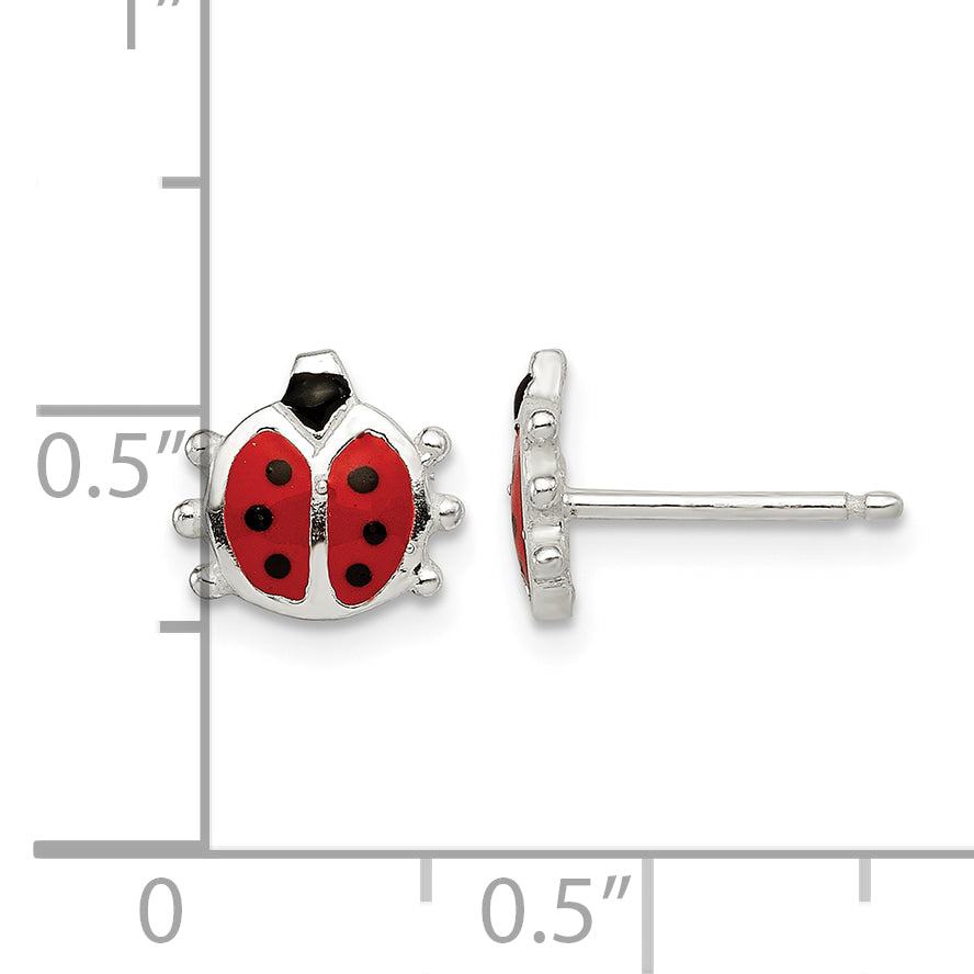 Sterling silver 3/8 inch ladybug stud earrings next to a half inch scale