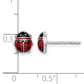 Sterling silver ladybug stud earrings next to a half inch scale