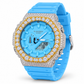 Iced out G-Shock watch with sky blue band and gold-accent bezel - angle