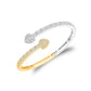 Two-tone yellow gold moissanite heart bypass bangle