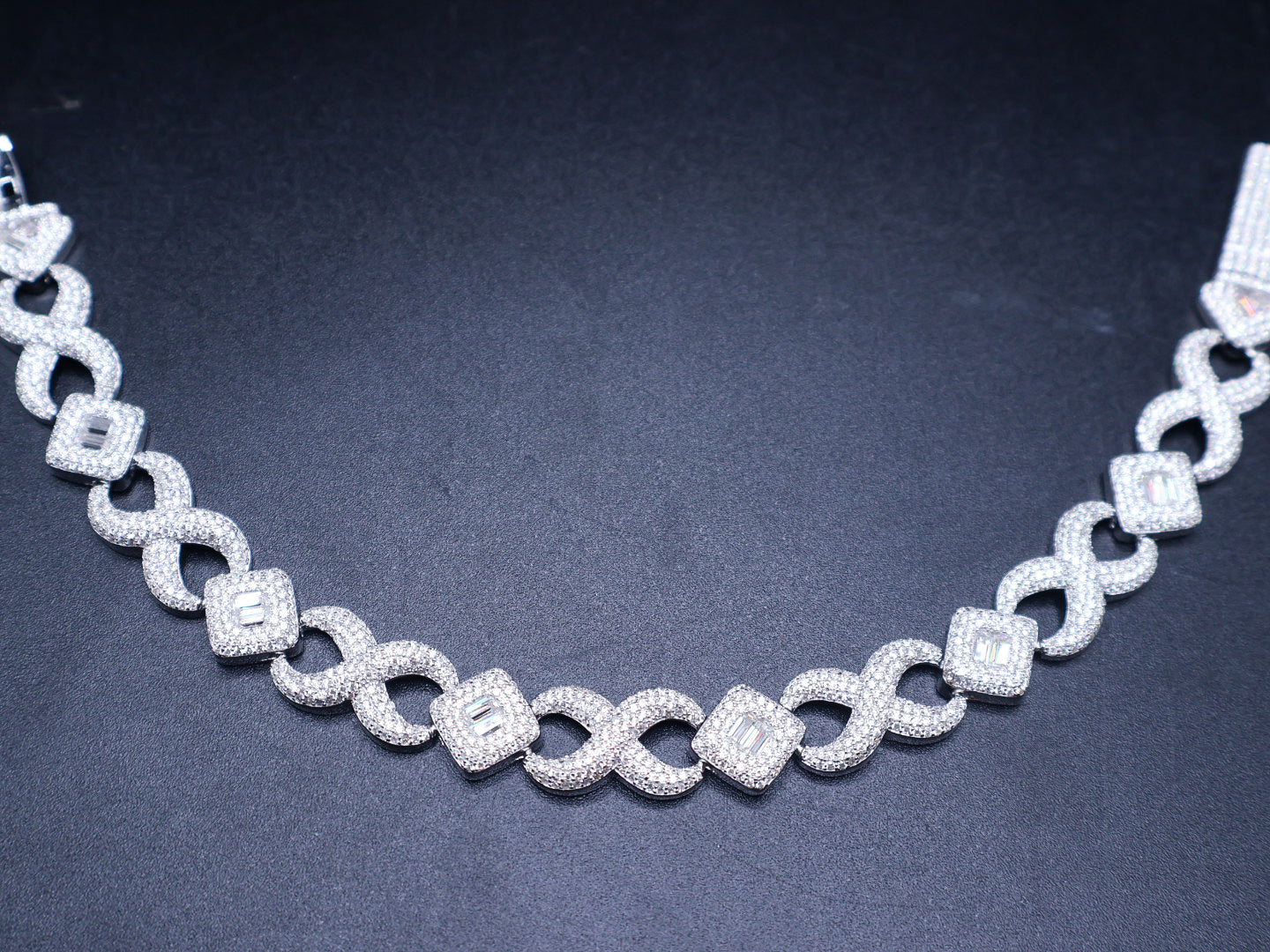 White gold moissanite baguette infinity bracelet, additional view