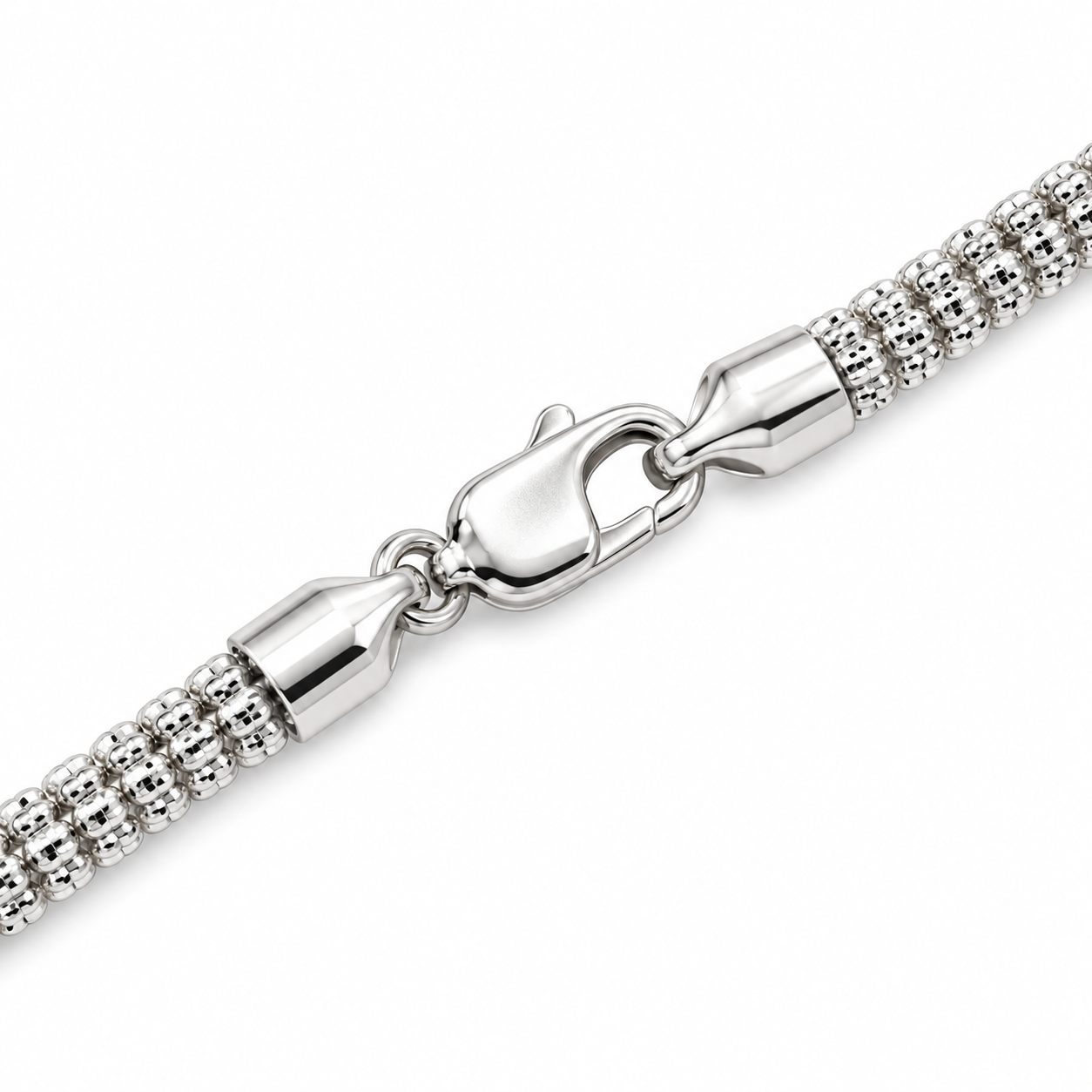 10K white gold diamond-cut rolo link bracelet, detail view